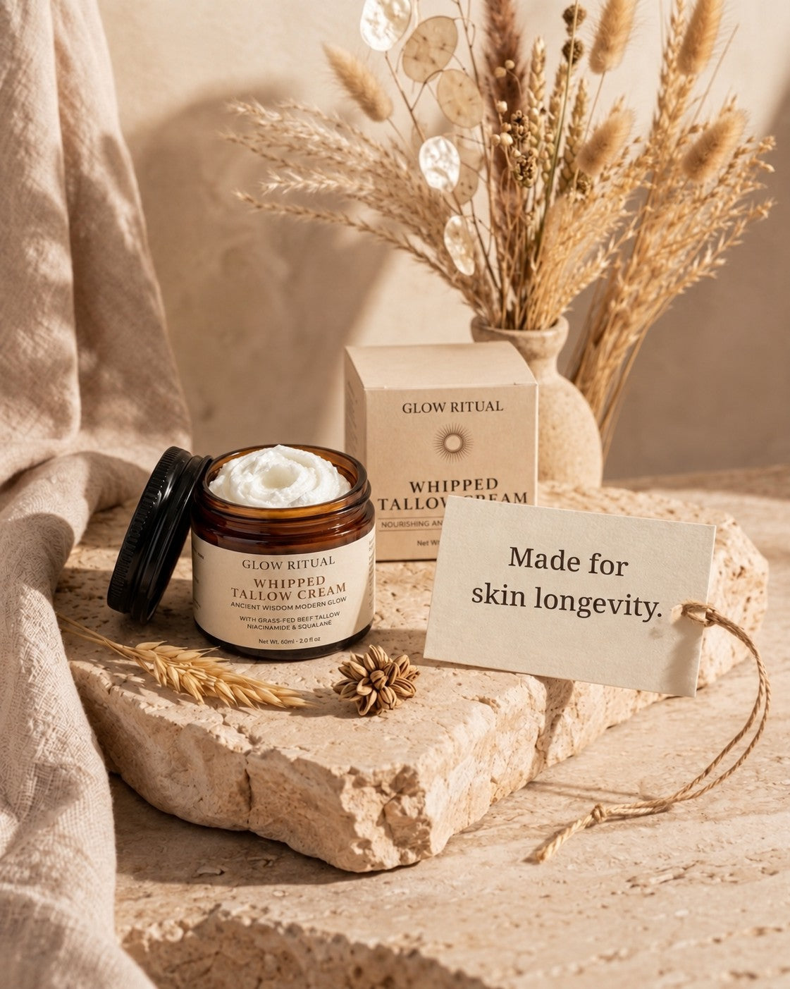 Glow Ritual Advanced Formula Tallow Moisturiser jar with whipped swirl texture and box